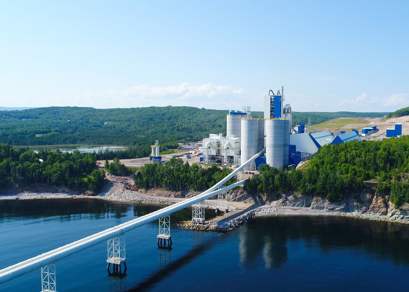 The McInnis Cement Plant, surrounded by water and trees